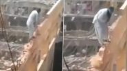 Funny Video: दीवार पर खड़े होकर उसे ही हथोड़ा मारकर गिराने लगा शख्स, वीडियो देख लोग हुए लोटपोट